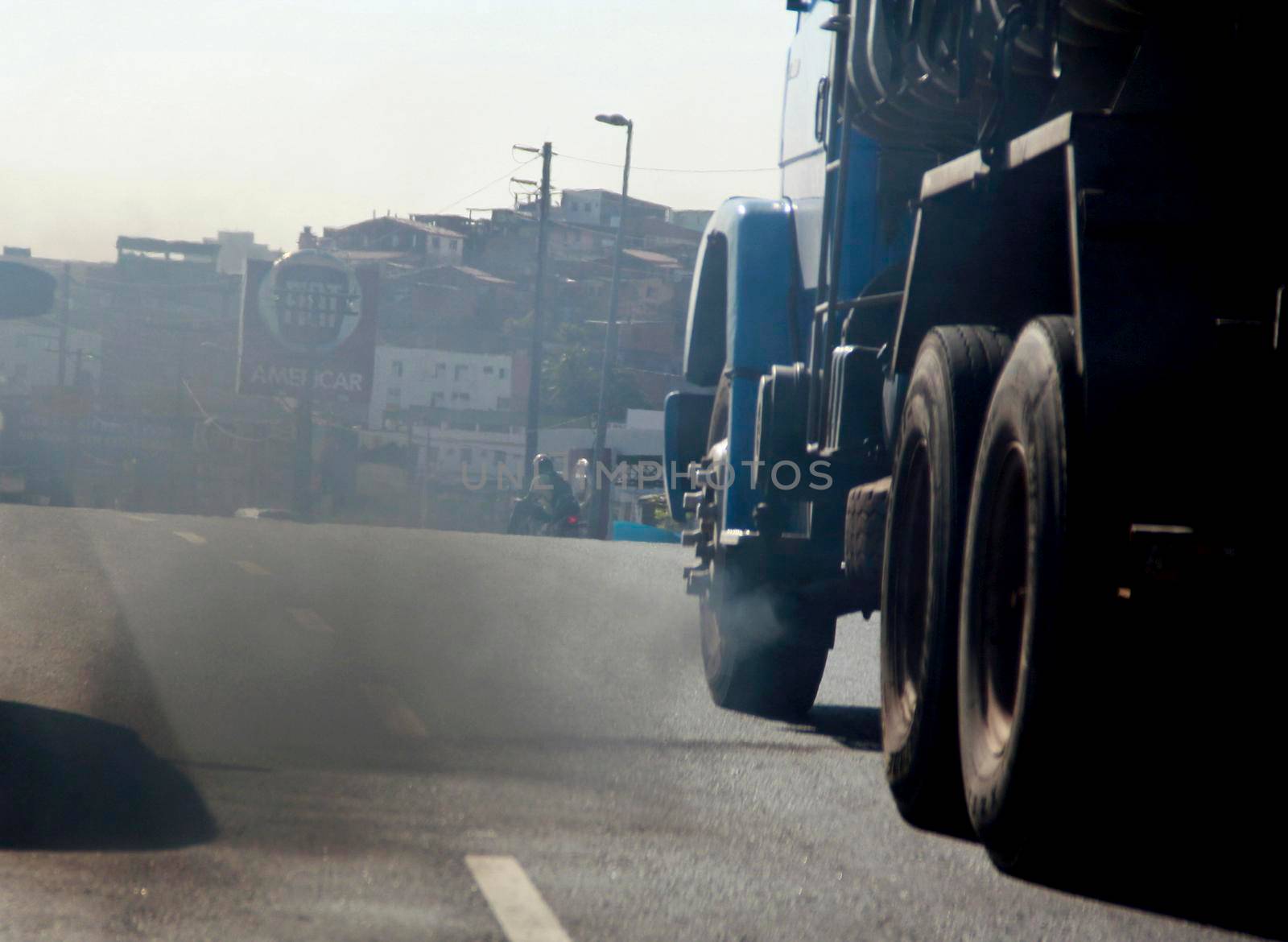 salvador, bahia / brazil - october 31, 2014: vehicle exhaust expelling gas resulting from fuel burning in internal explosion engines in the city of Salvador.

