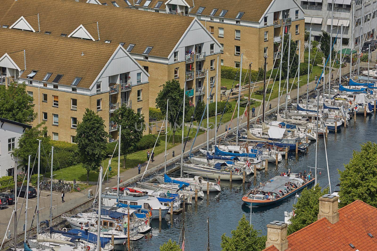 COPENHAGEN, DENMARK - SEPTEMBER 16, 2017: Canal Tour: beautiful view on Copenhagen water front. Canal Tours Copenhagen is a wonderful way of seeing this city.