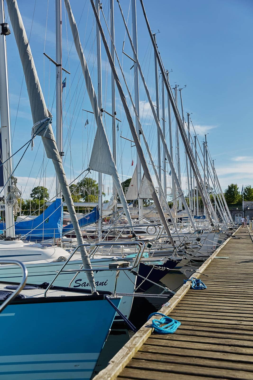 Luxury speedboats docked along side of wooden promenade at Danish capital of Copenhagen by wondry