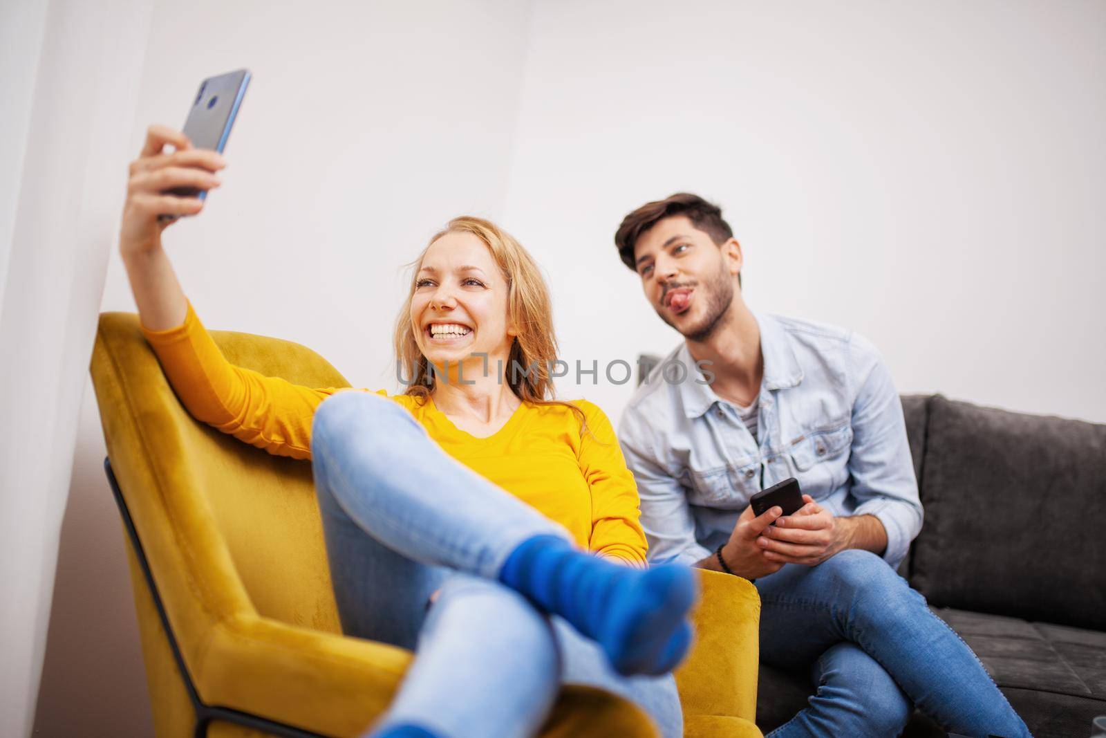 couple in love taking selfie and smiling by kokimk