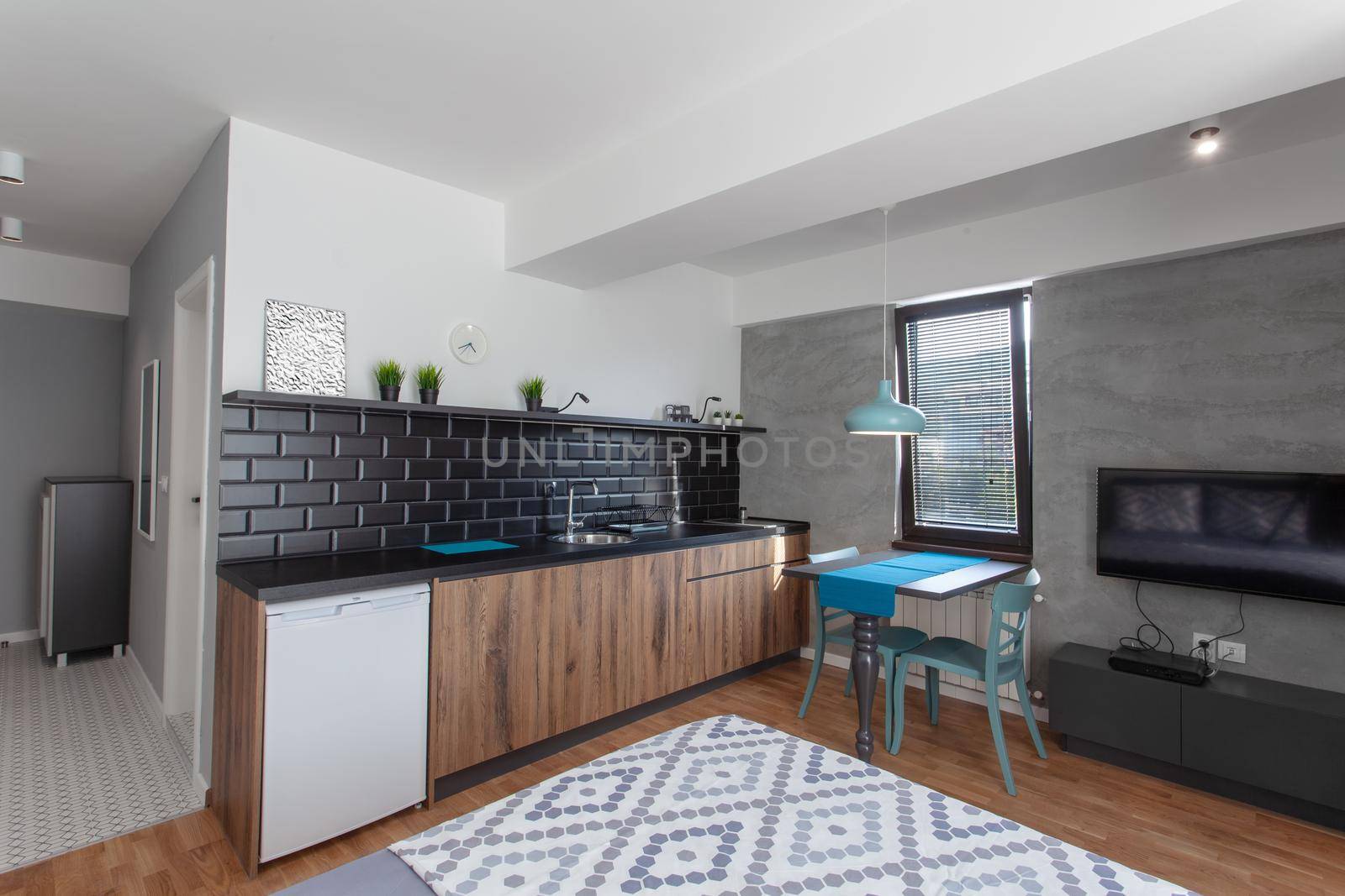 kitchen and bed in a modern apartment