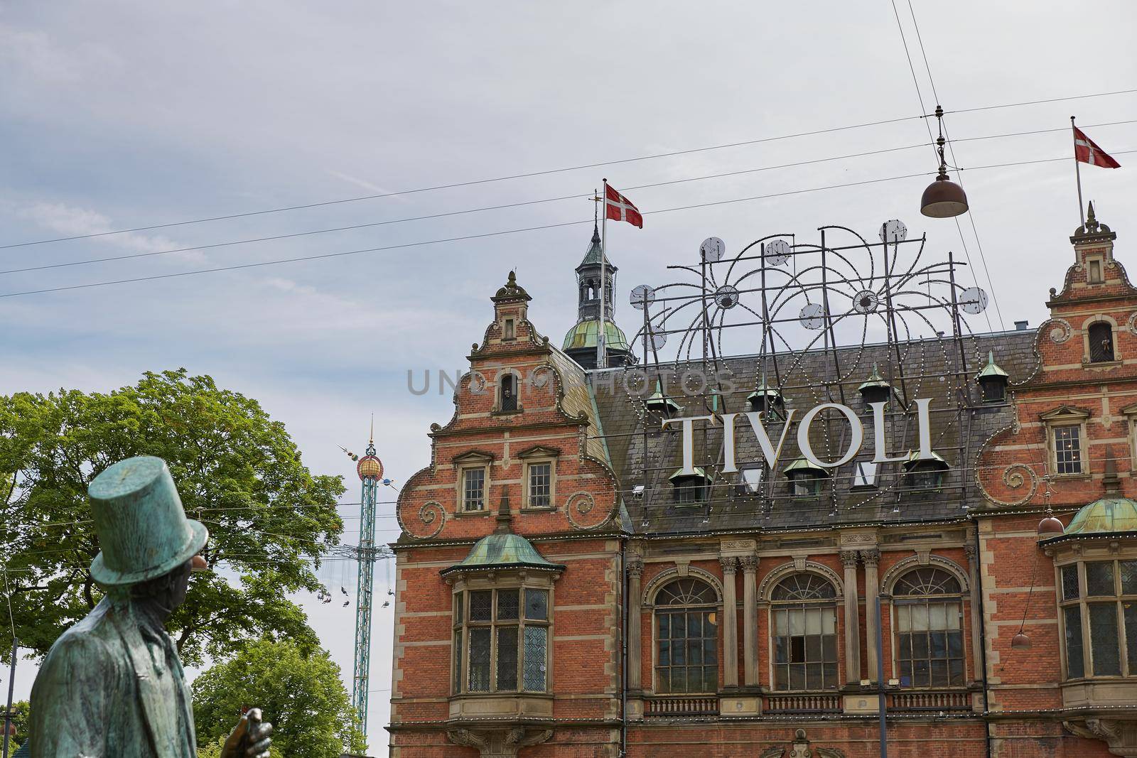 Statue of H. Ch. Andersen and Tivoli amusement park in Copenhagen, Denmark by wondry