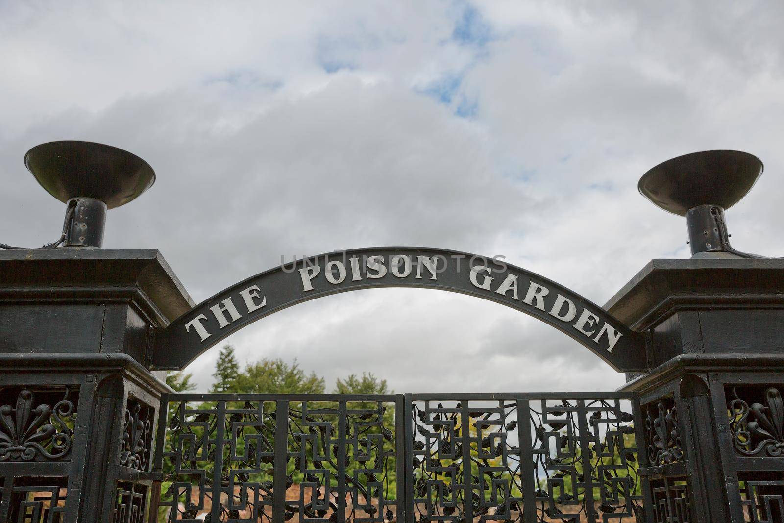 ALNWICK, NORTHUMBERLAND, ENGLAND, UK - SEPTEMBER 10, 2017: Alnwick Garden - entrance into the poison garden. A contemporary pleasure gardens adjacent to Alnwick Castle in Northumberland county in the UK