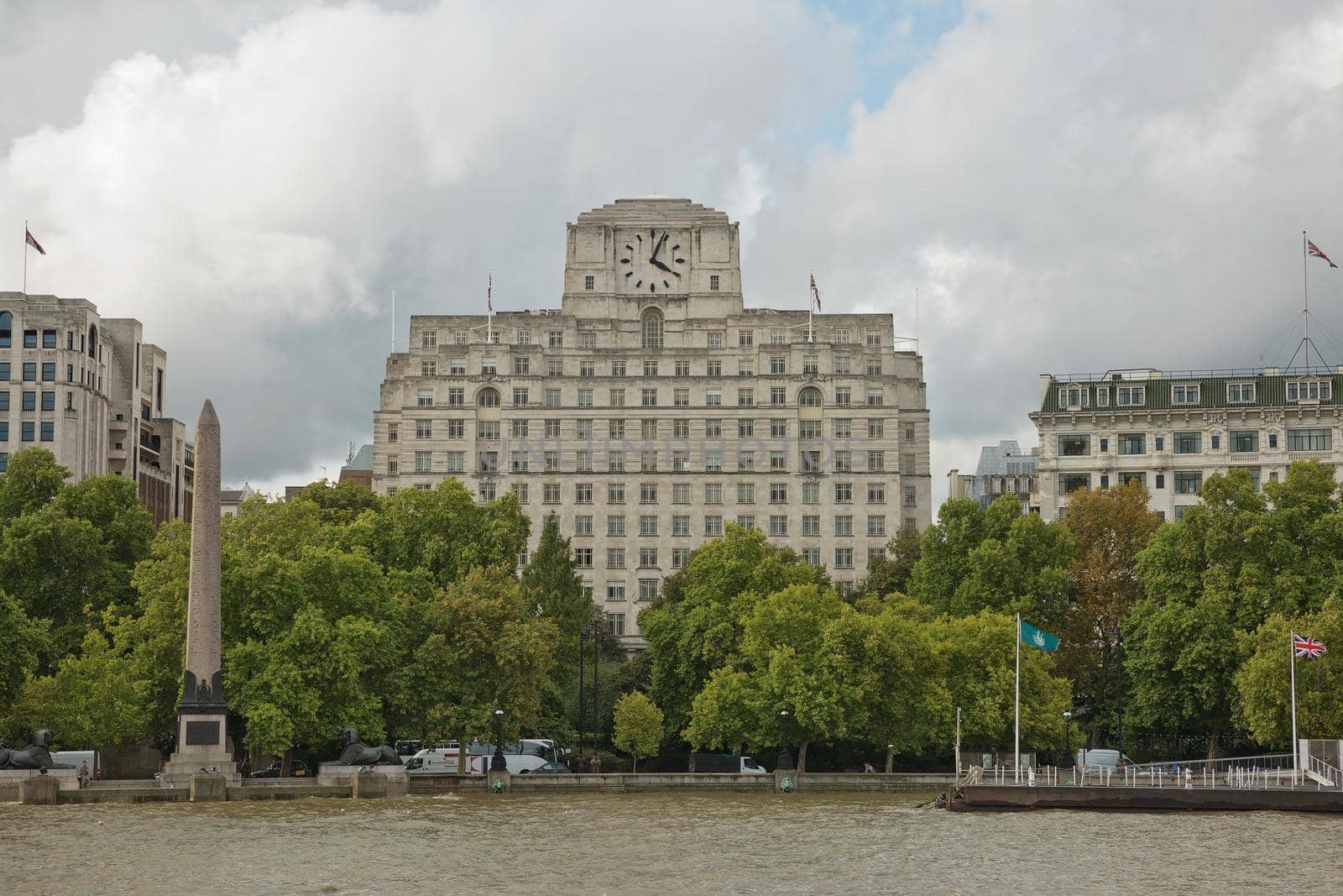 View of architecture of the city of London in UK alongside the riverbank of River Thames by wondry