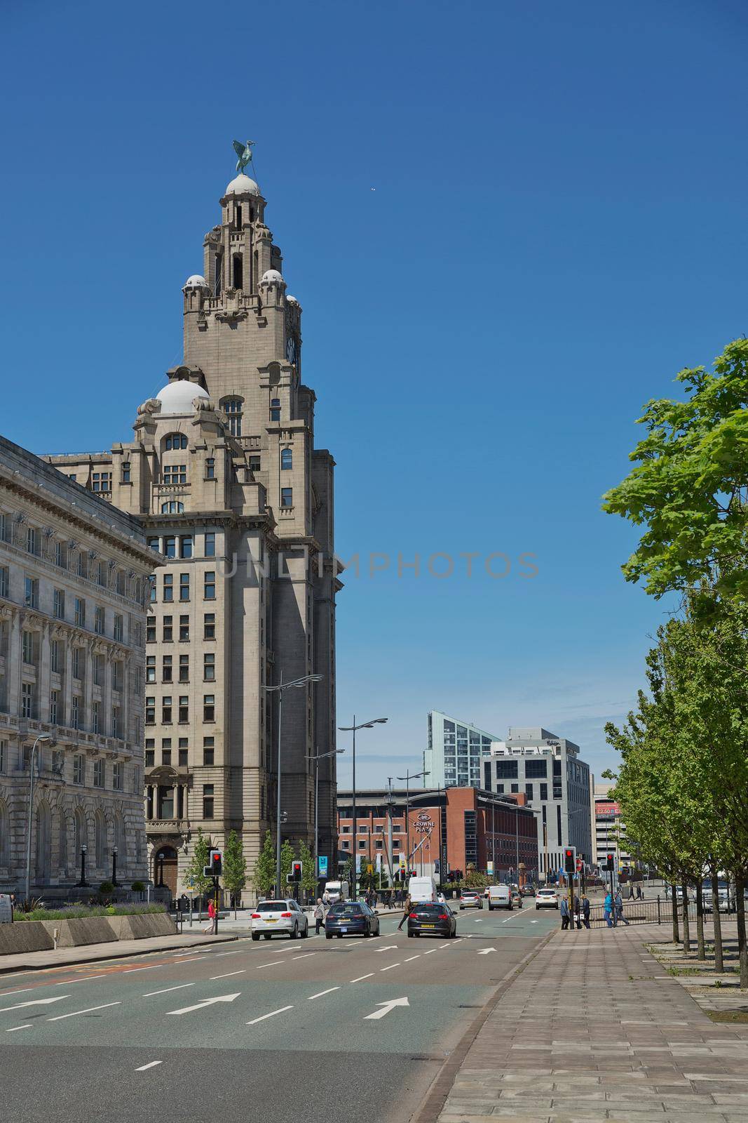 LIVERPOOL, ENGLAND, UK - JUNE 07, 2017: Architecture and traffic at the Strand street in Liverpool city, England