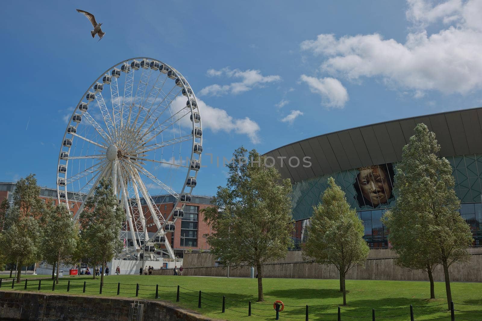 LIVERPOOL, ENGLAND, UK - JUNE 07, 2017: View of the ECHO convention center and an adjacent ferris wheel in Liverpool, England