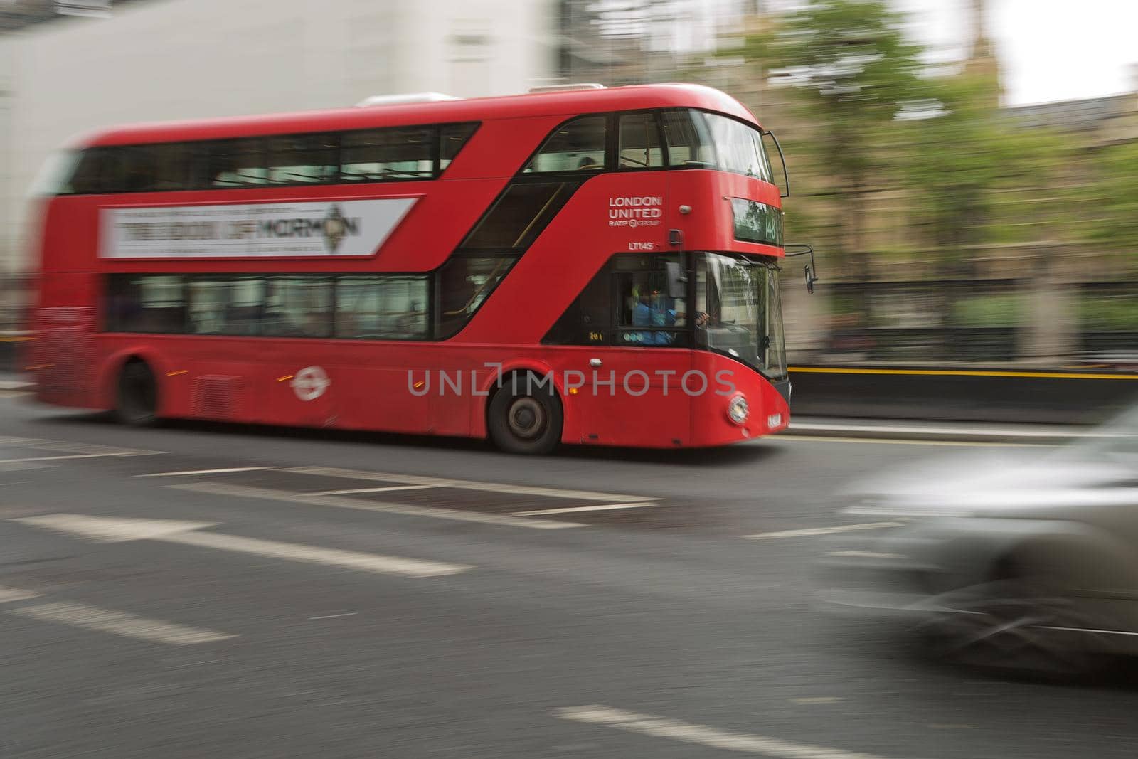 LONDON, UK - SEPTEMBER 08, 2017: Blurred movement of iconic old red double decker through the streets of London in UK.