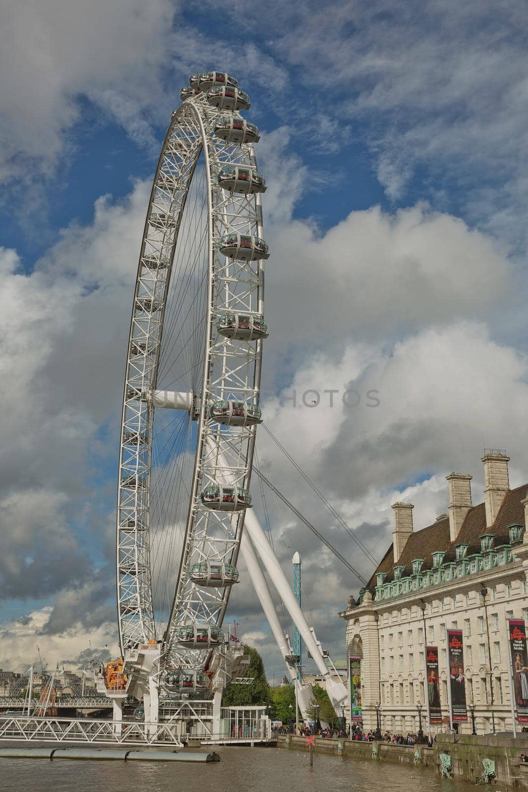 LONDON, UK - SEPTEMBER 08, 2017: View of the London Eye wheel and South Bank of the River Thames from Westminster bridge, London, UK