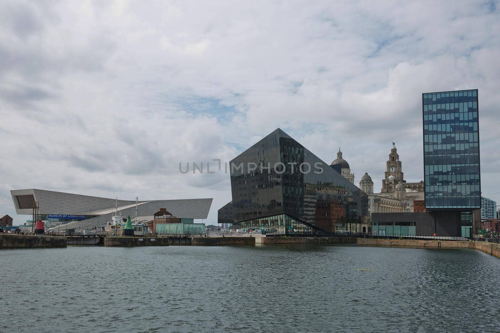 LIVERPOOL, ENGLAND, UK - JUNE 07, 2017: Modern building of Museum of Liverpool and Open Eye Gallery in Liverpool in UK viewed from Canning Dock