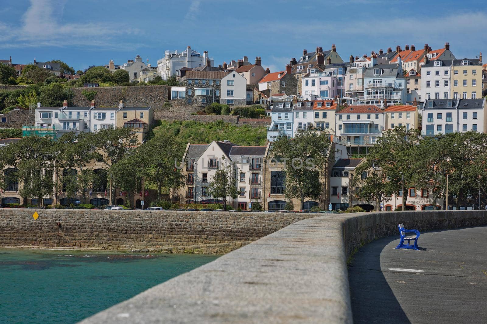 ST. PETER PORT, GUERNSEY, UK - AUGUST 16, 2017: Scenic view of a bay in St. Peter Port in Guernsey, Channel Islands, UK.