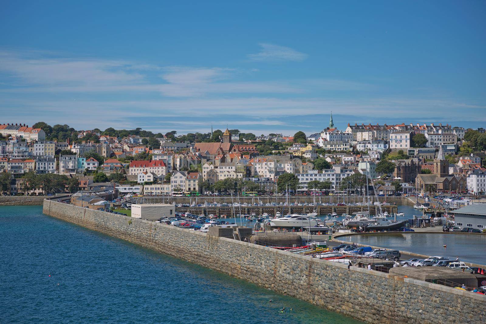 ST. PETER PORT, GUERNSEY, UK - AUGUST 16, 2017: Scenic view of a bay in St. Peter Port in Guernsey, Channel Islands, UK.