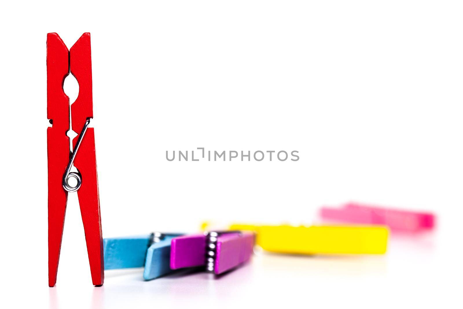 group of clothes pegs isolated on white background