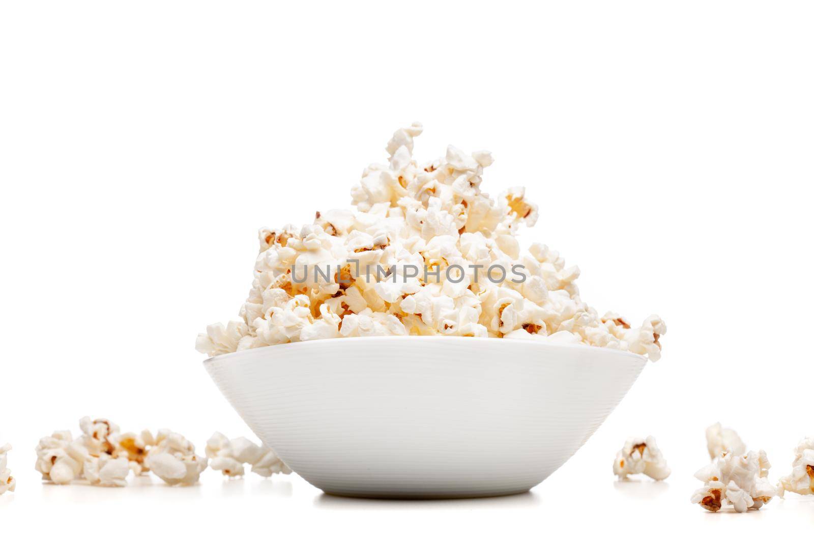 white bowl with popcorn by kokimk