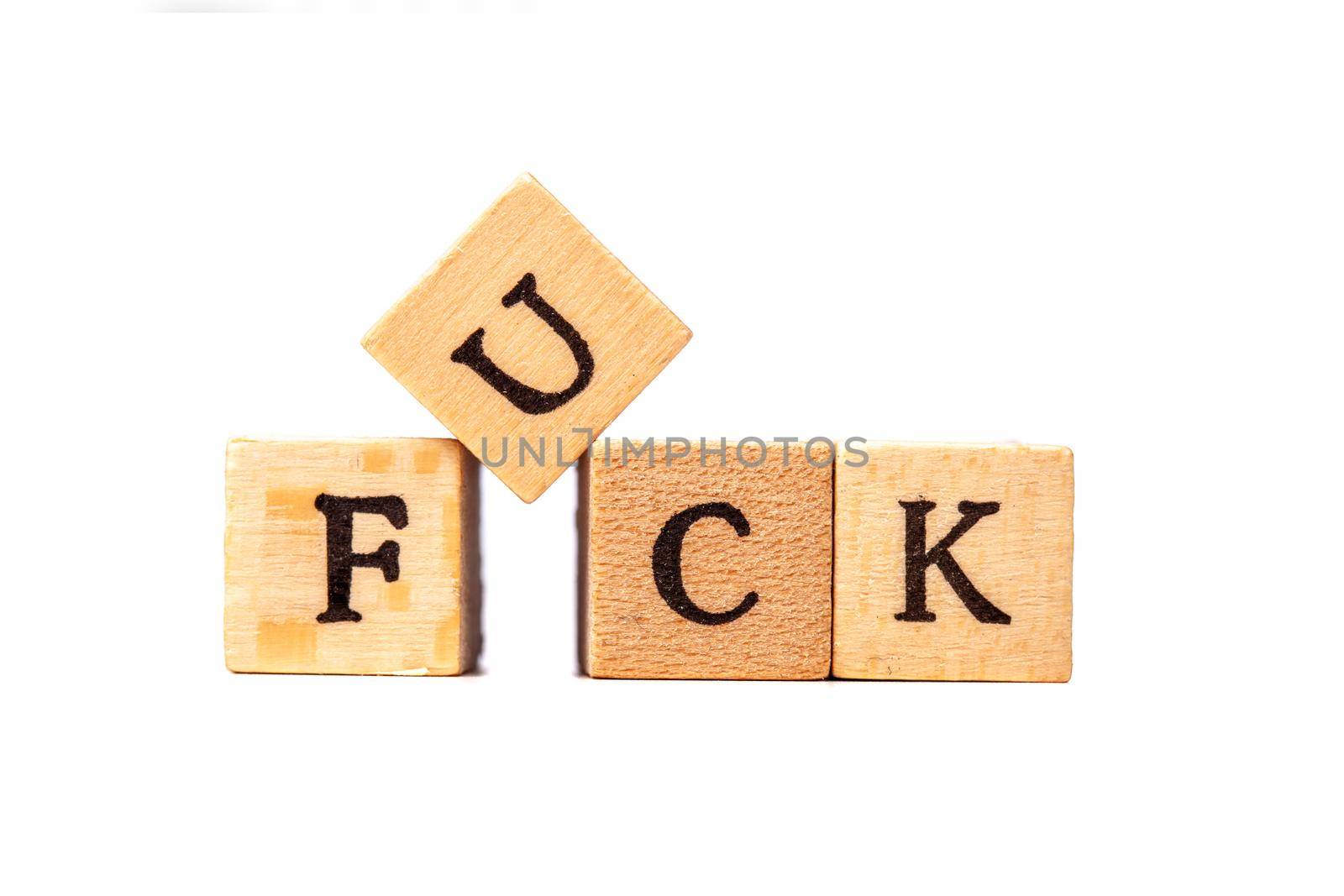the f word on wooden cubes isolated on white