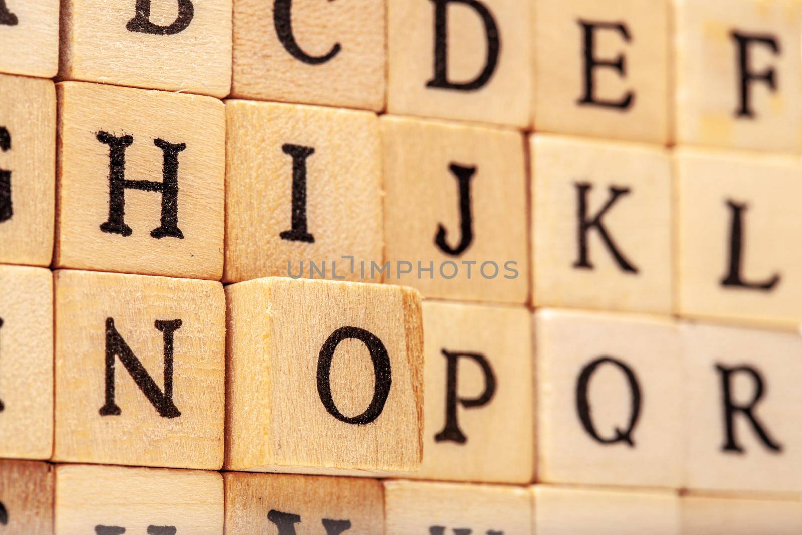 latin alphabet letters on wooden cubes