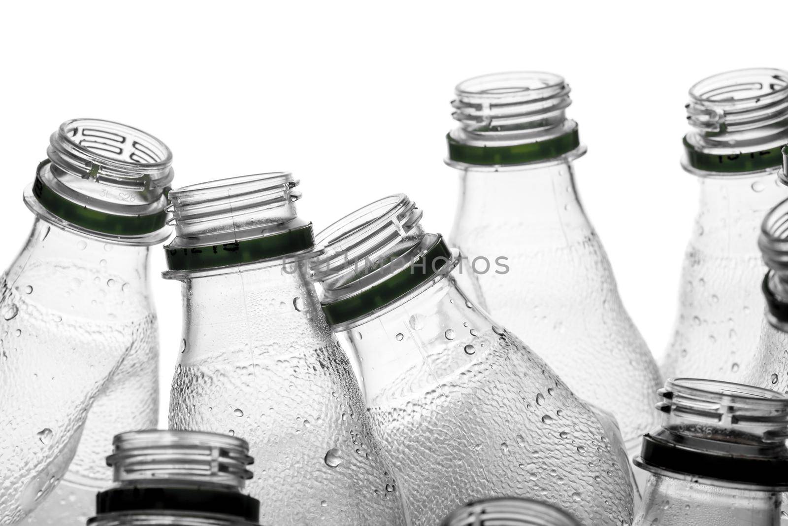 group of smashed empty plastic bottles, isolated on white background