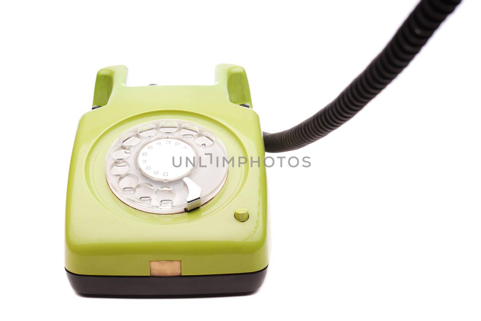 Green telephone retro style on white background. Vintage phone handset receiver by kokimk