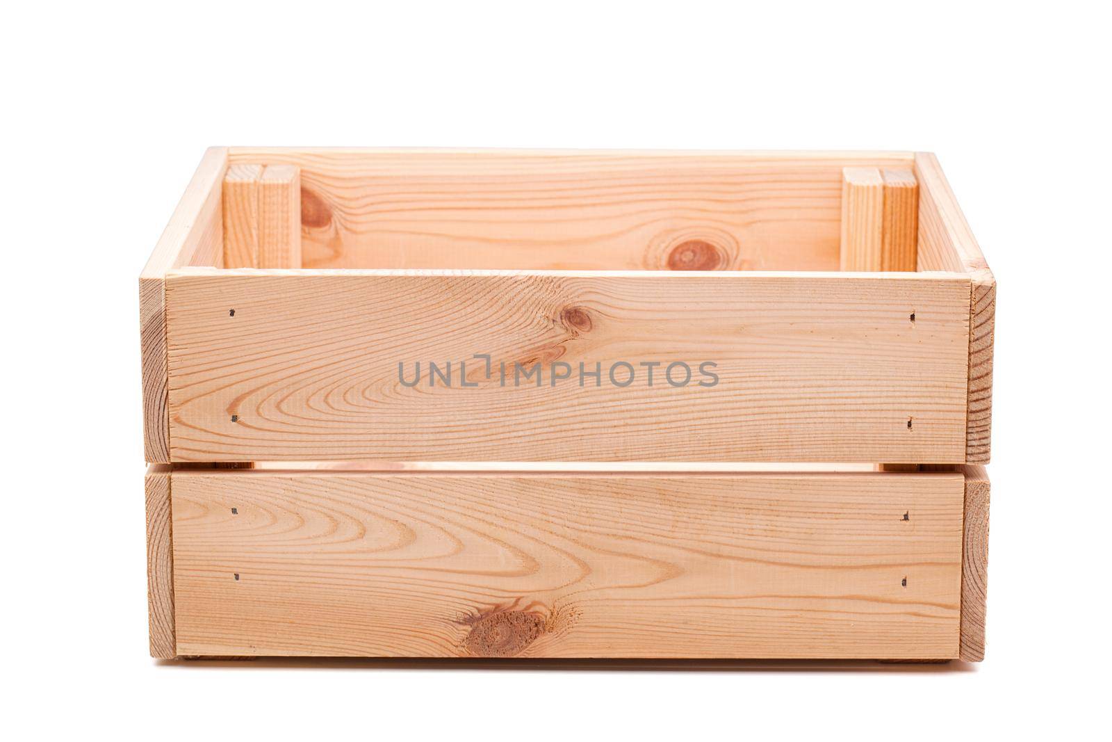 small wooden crate isolated on white background. side view. by kokimk