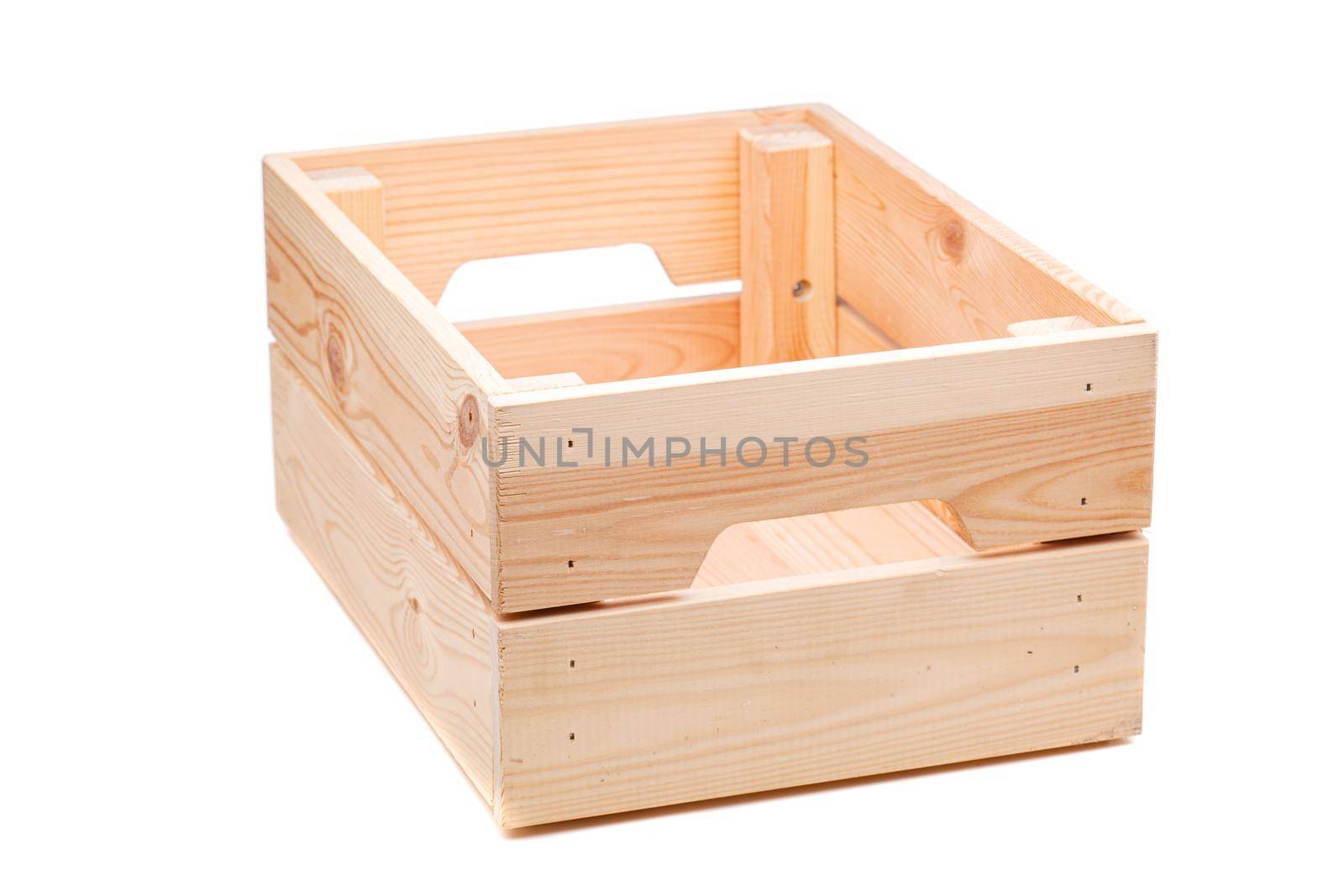 small wooden crate isolated on white background. by kokimk