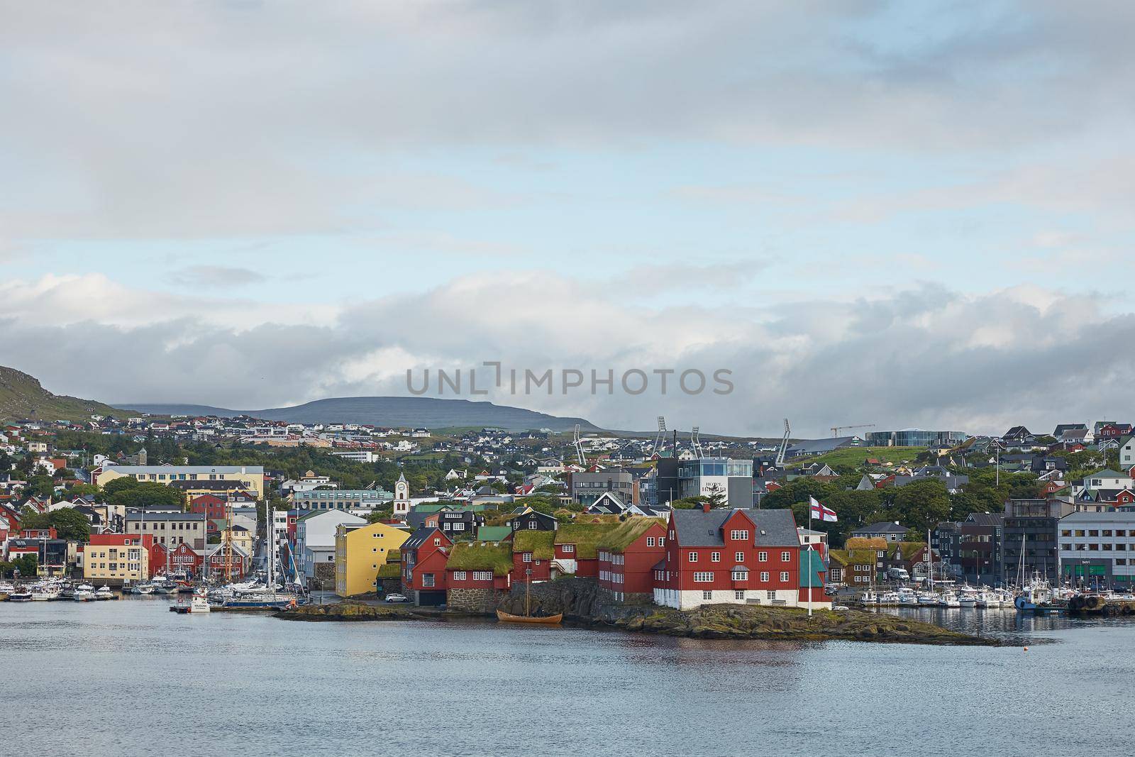 TORSHAWN, FAROE ISLANDS, DENMARK - AUGUST 21, 2018: Overview of the downtown and bay area of Torshawn, the capital town of Faroe Islands, Denmark.