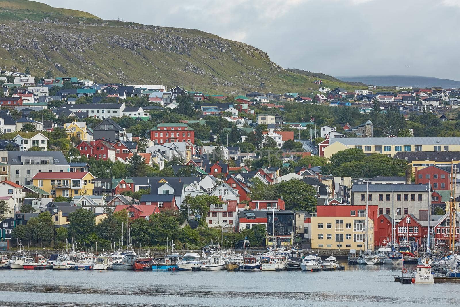 Torshawn, Capital of Faroe Islands with its downtown area and port in bay by wondry