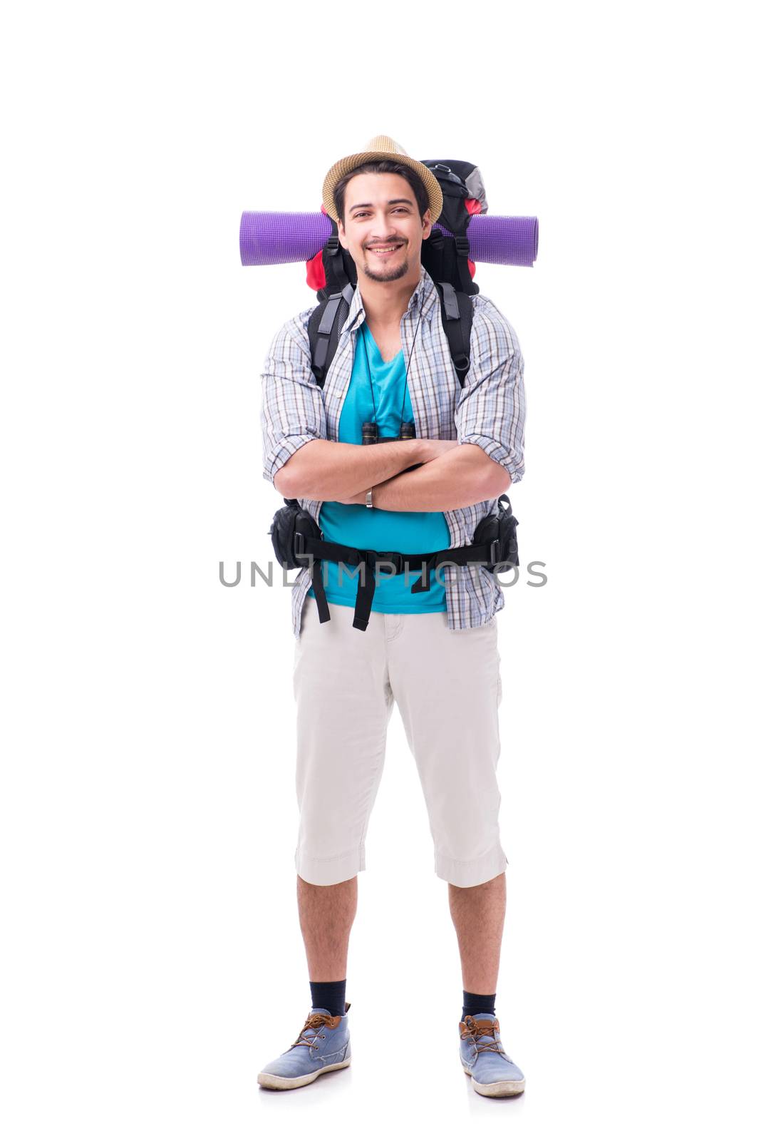 Backpacker with large backpack isolated on white