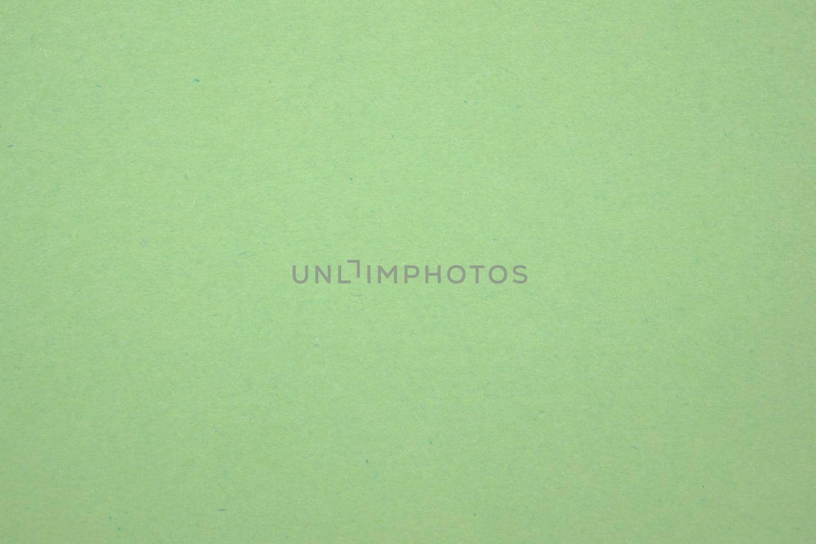 A dense industrial sheet of paper with a textured surface