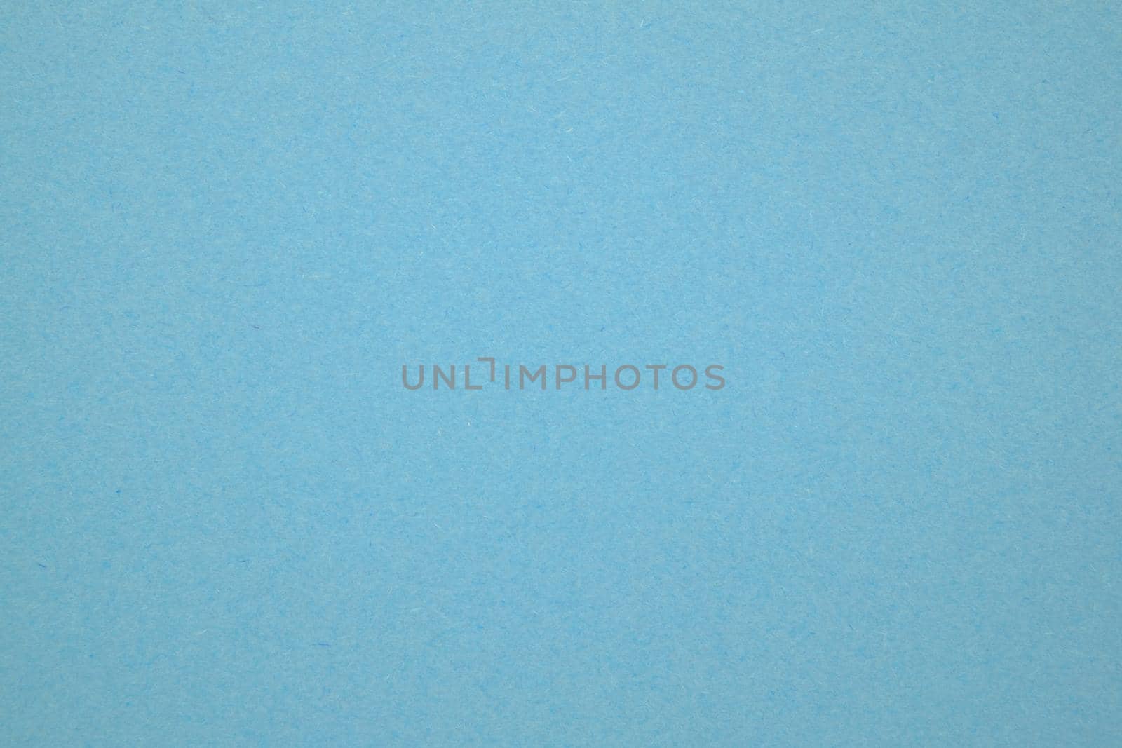 A dense industrial sheet of paper with a textured surface