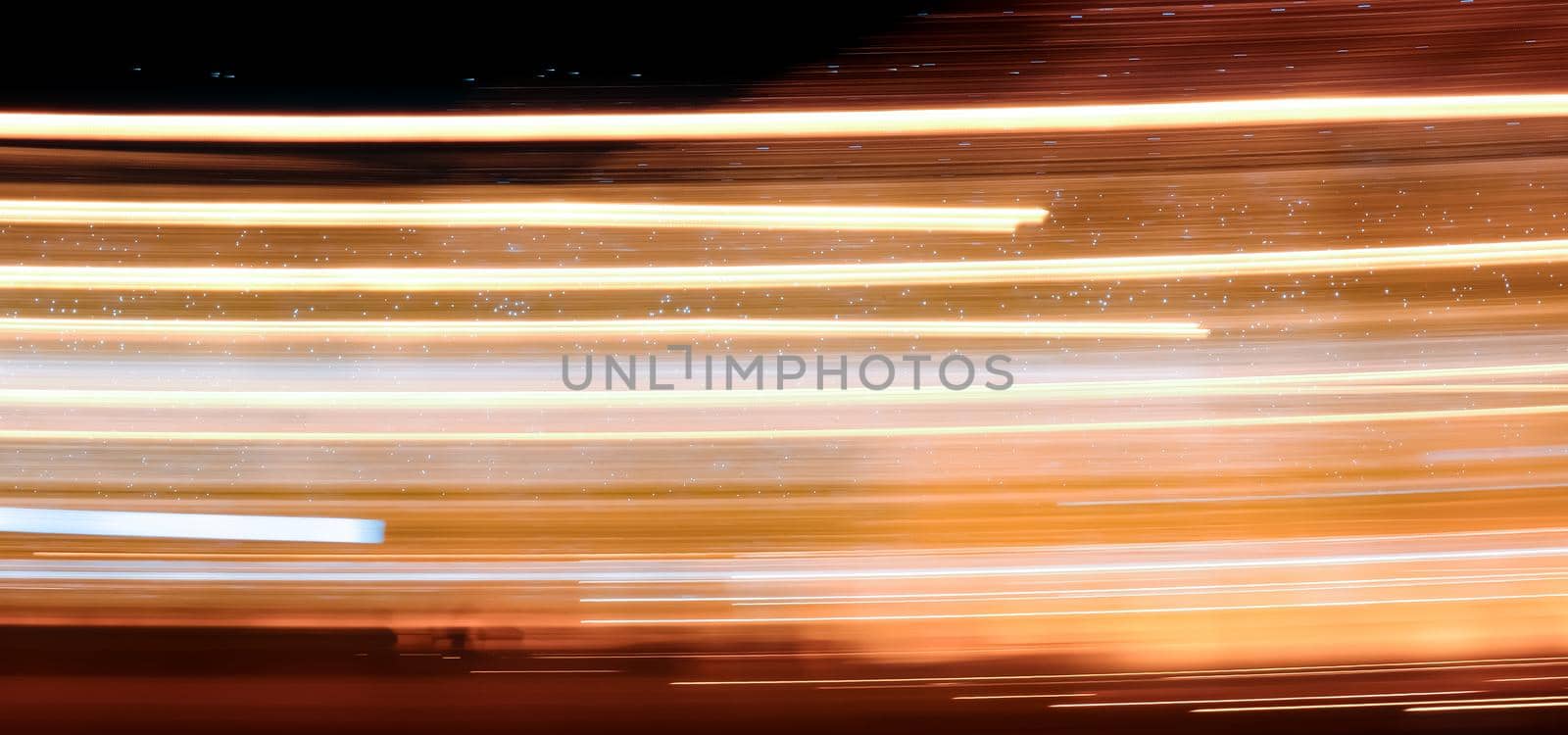 Abstract light trails on the dark background