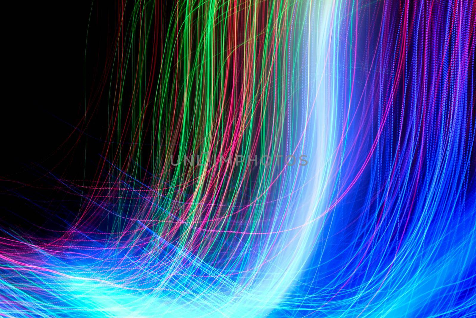 Abstract motion curved lights on dark background