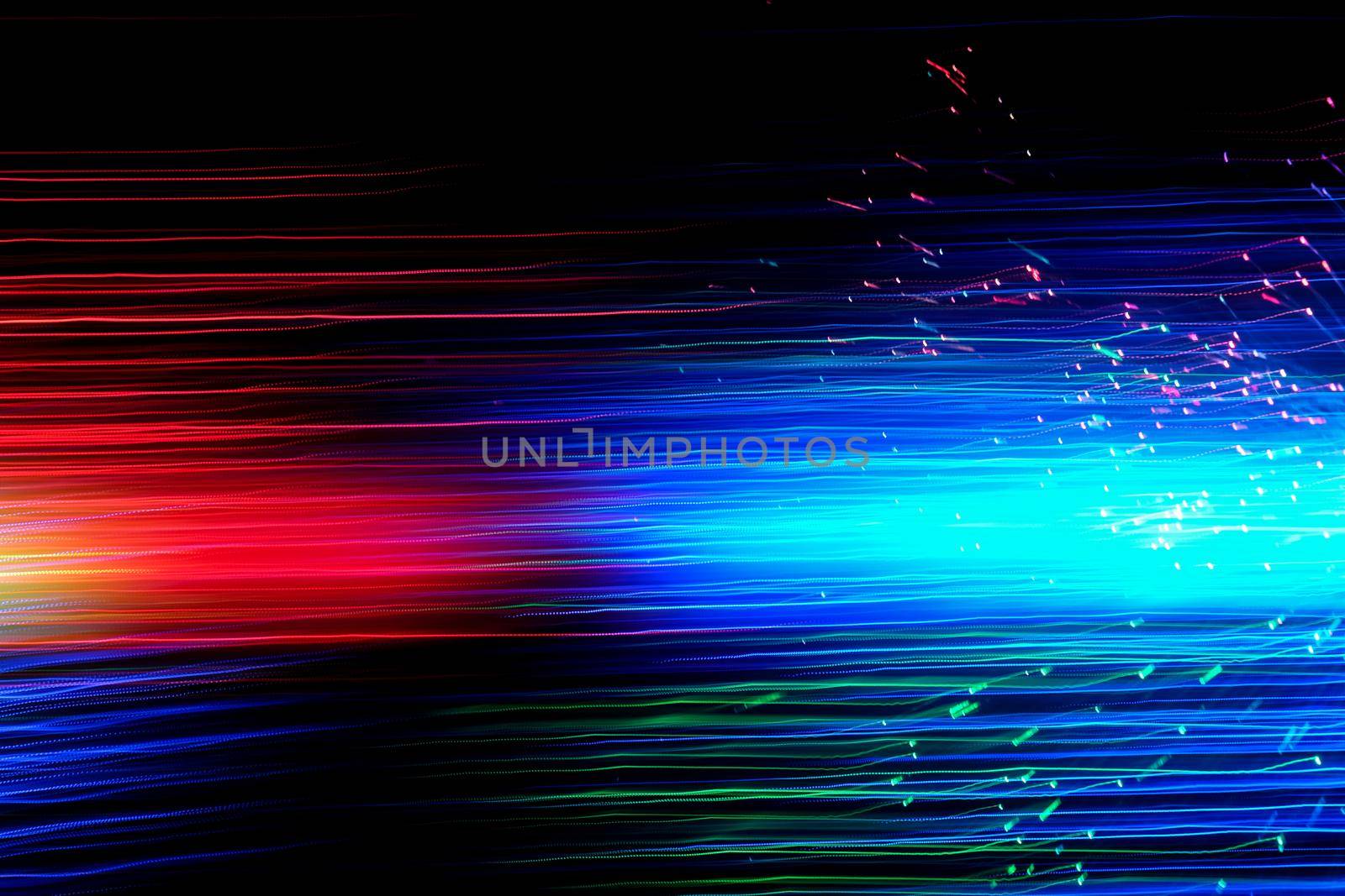 Abstract motion curved lights on dark background