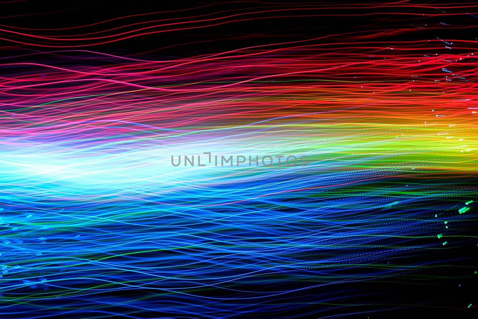 Abstract motion curved lights on dark background