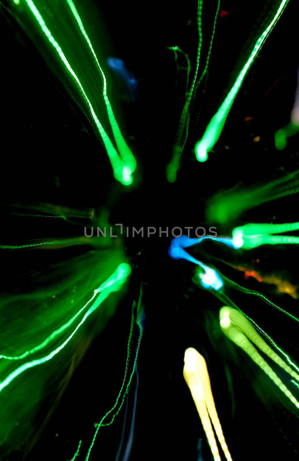 Abstract motion defocused lights on dark background