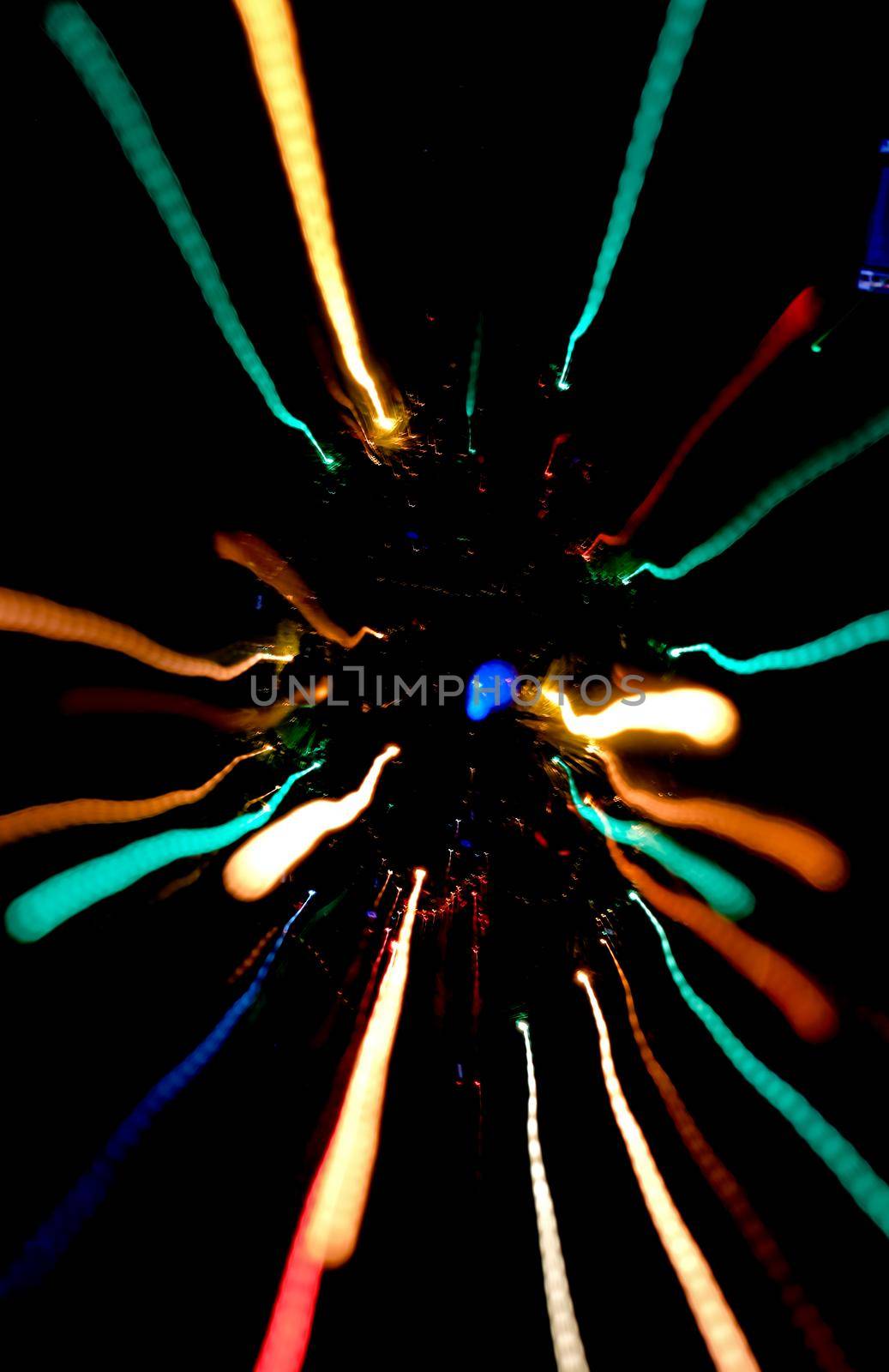 Abstract motion defocused lights on dark background