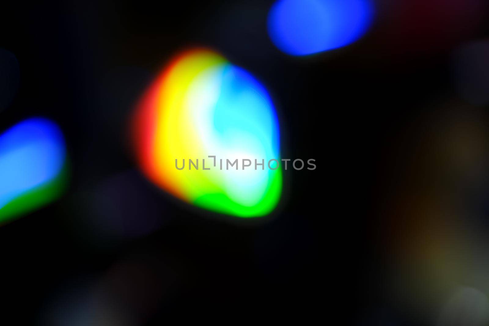 Abstract motion defocused lights on dark background