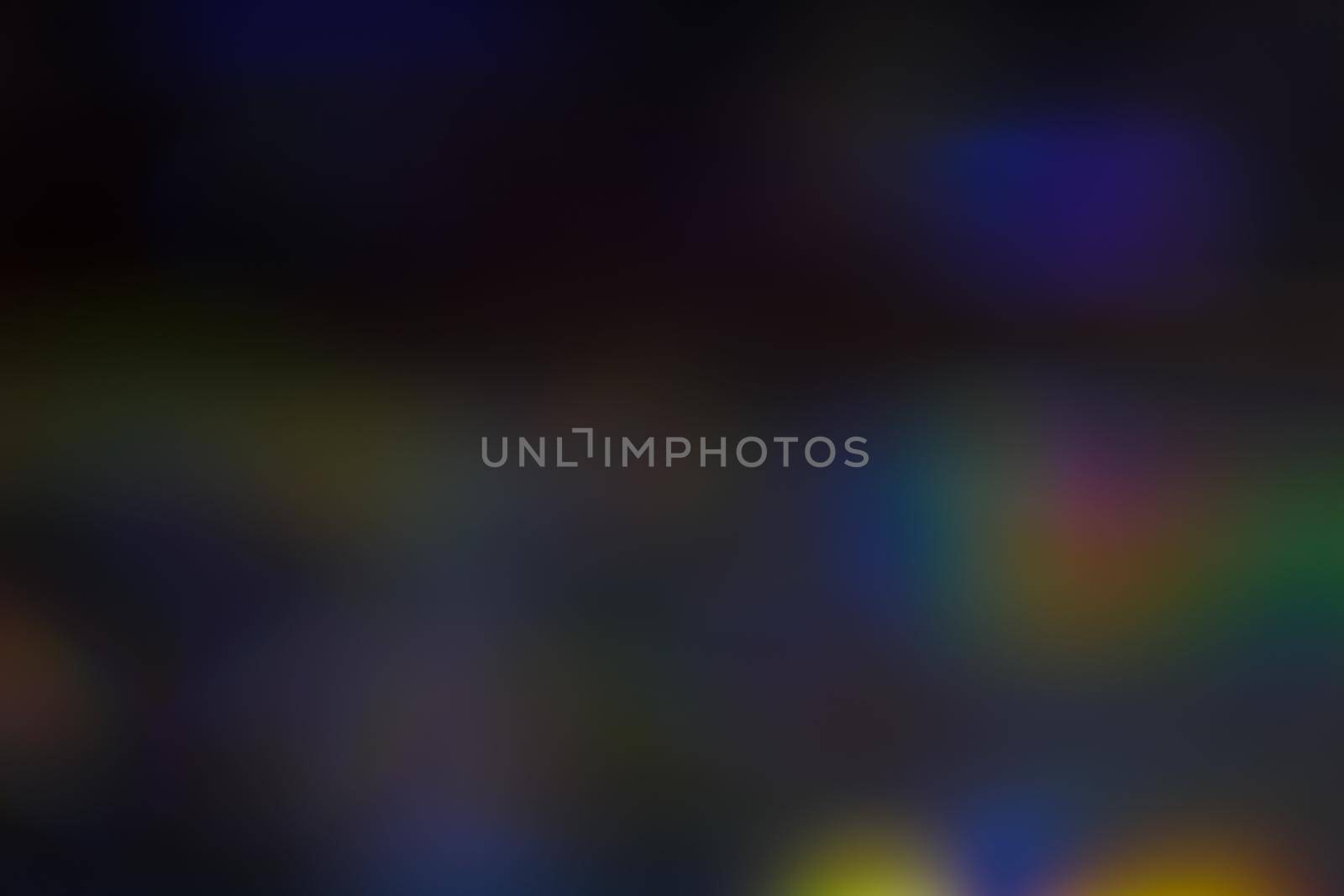 Abstract motion defocused lights on dark background