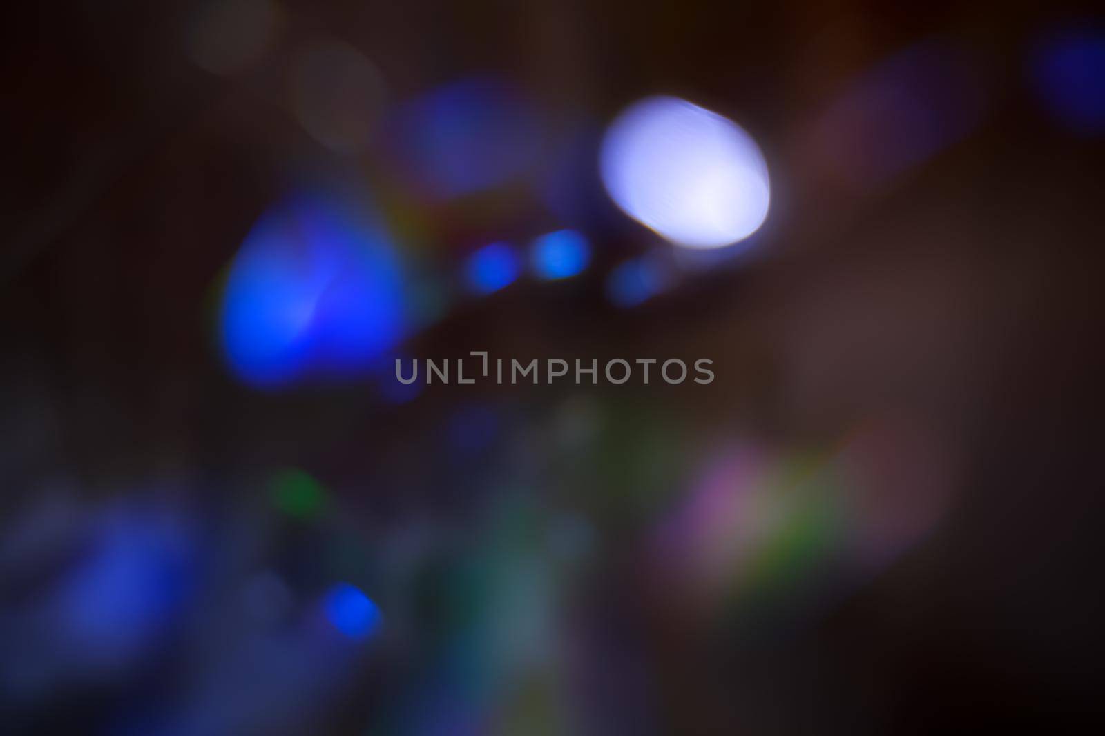 Abstract motion defocused lights on dark background