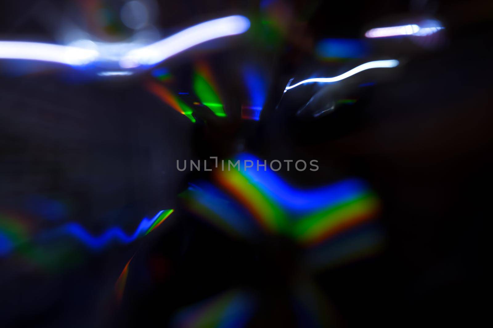 Abstract motion defocused lights on dark background
