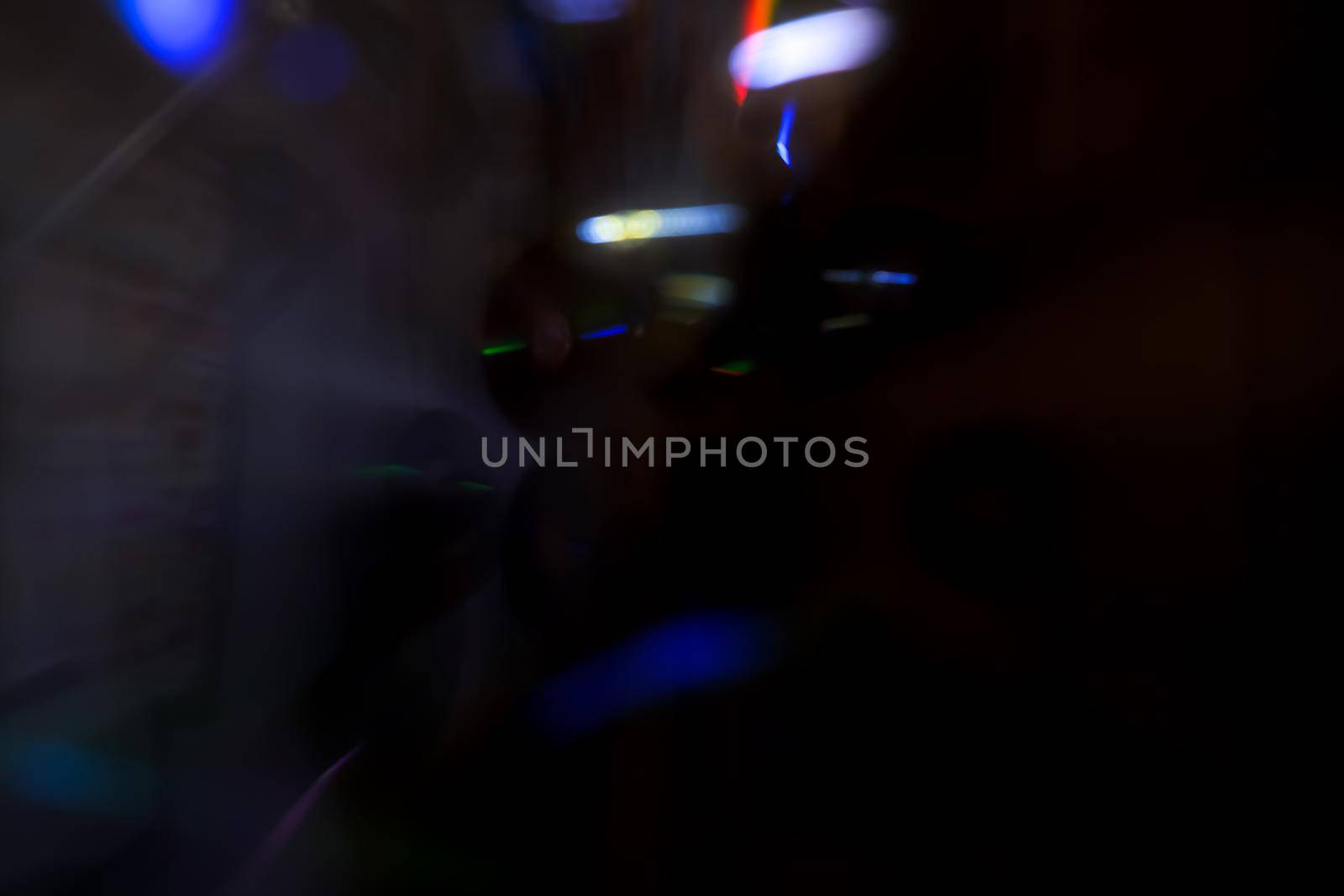 Abstract motion defocused lights on dark background