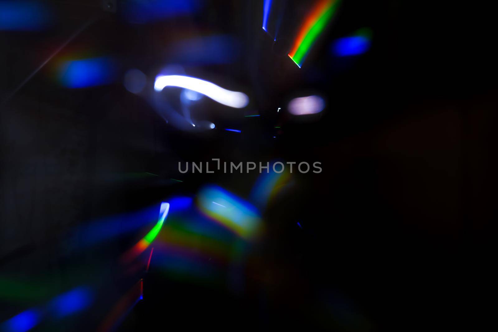 Abstract motion defocused lights on dark background