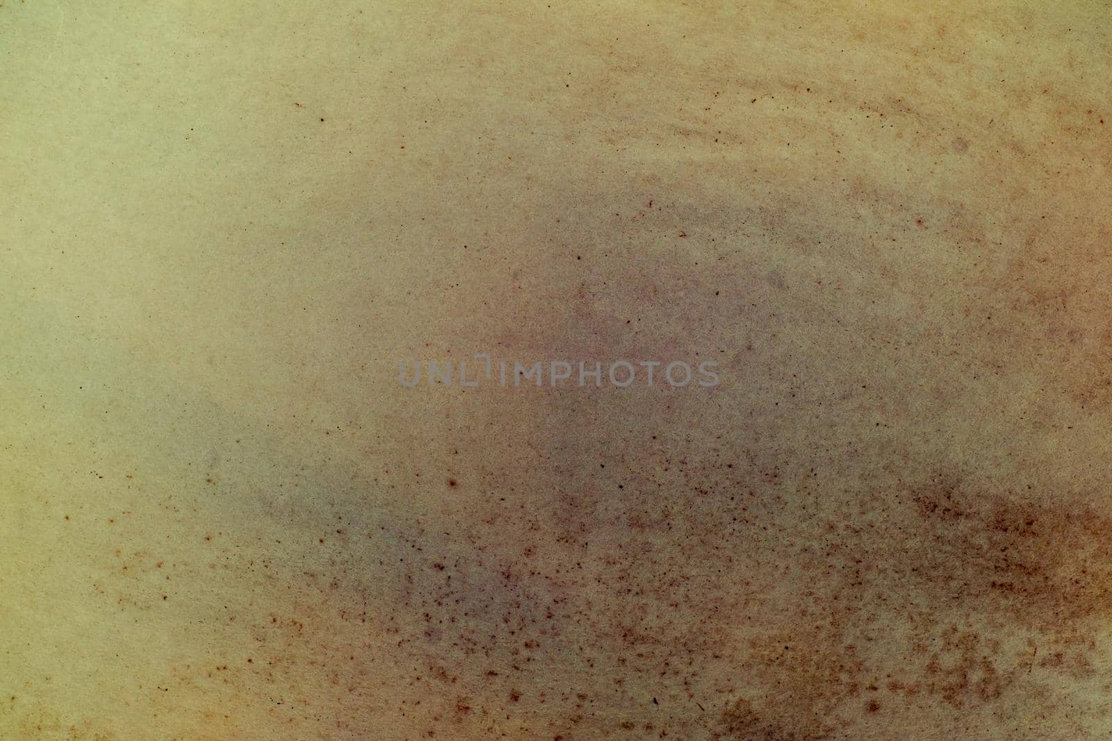 Aging, worn paper with water stains and rough edges
