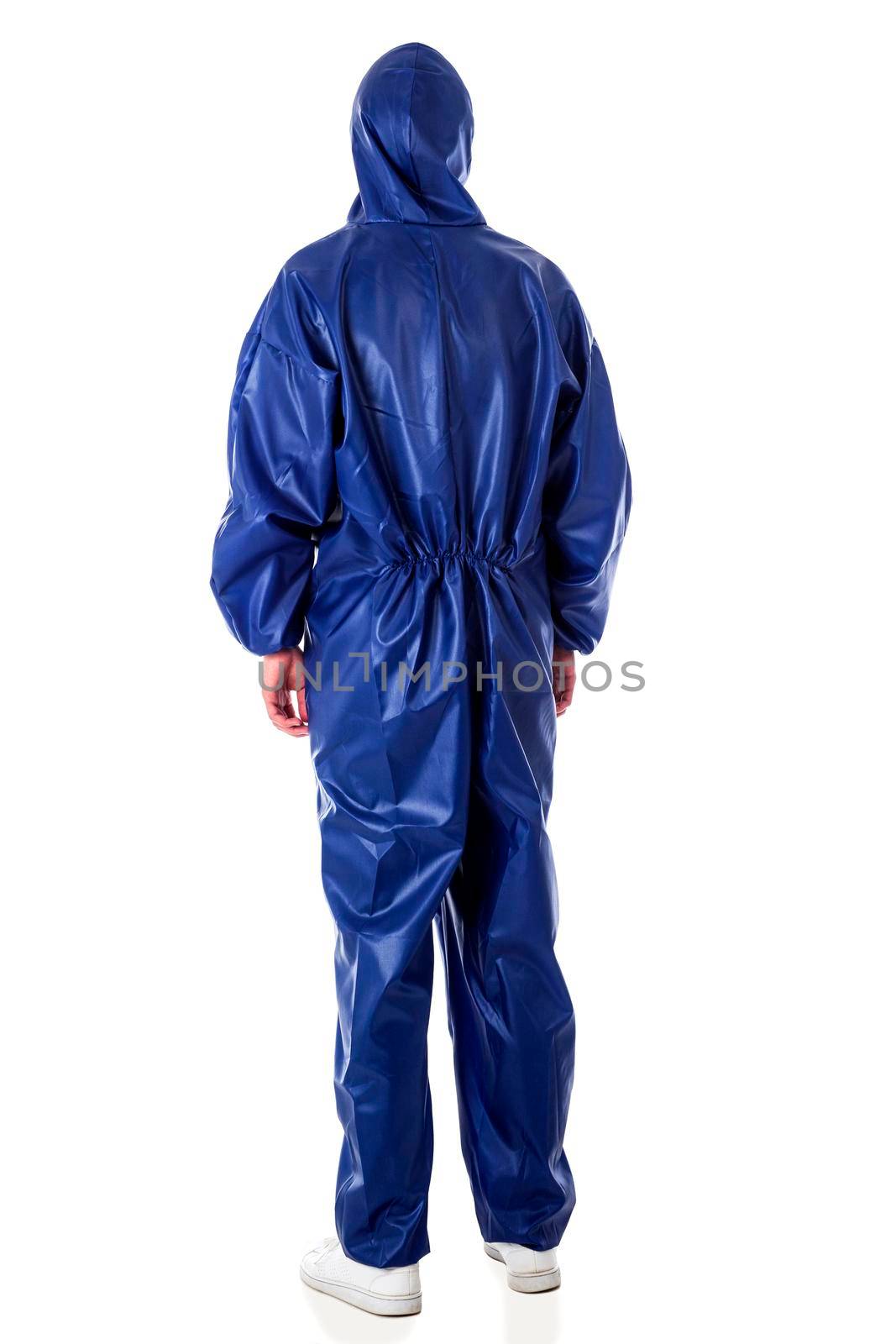 Man wearing blue protective suit isolated on white background by Nobilior