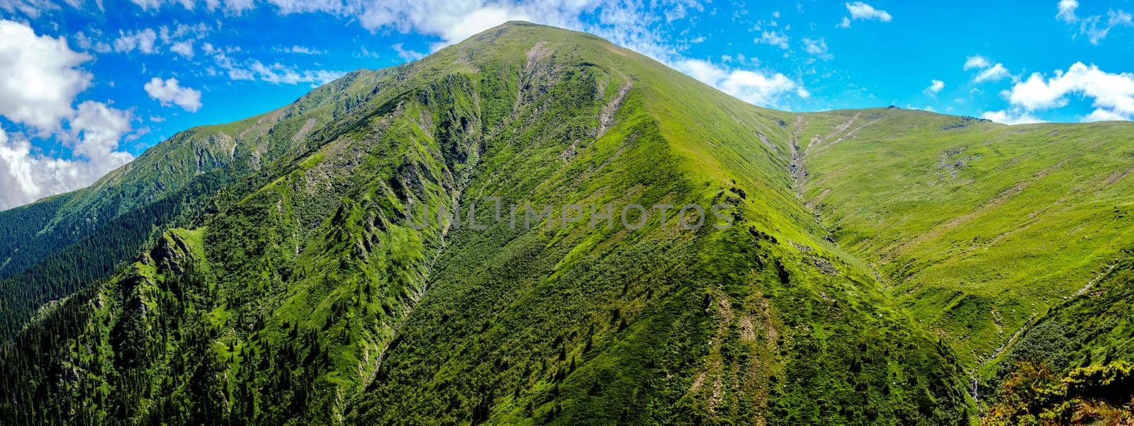 Scenic panoramic view of majestic peak Suru 2281m in Carpathian Mountains, Transylvania, Romania