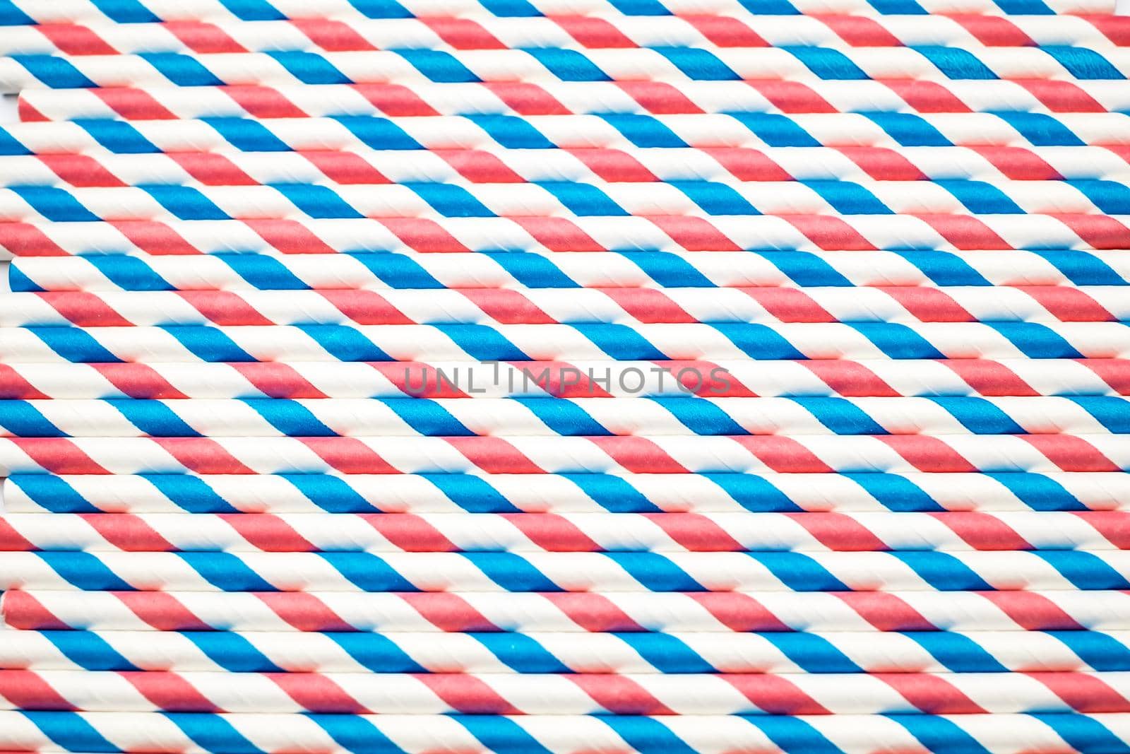spiral striped drinking straws isolated on white background