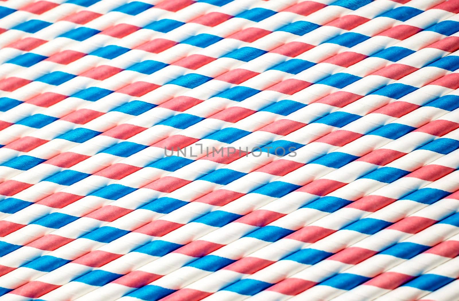 spiral striped drinking straws isolated on white background