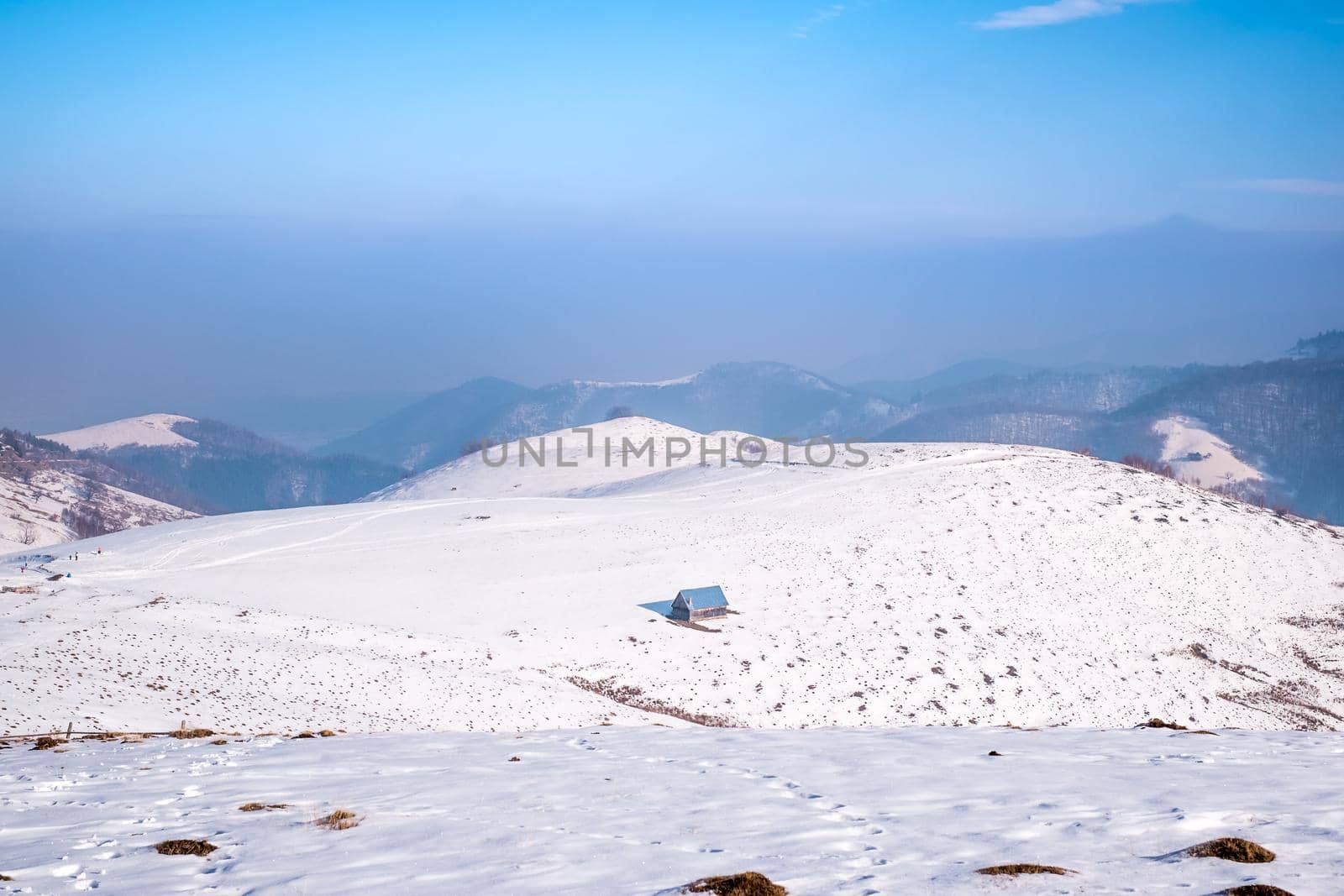sun over the winter mountains with snow, Cindrel mountains, Paltinis, Romania