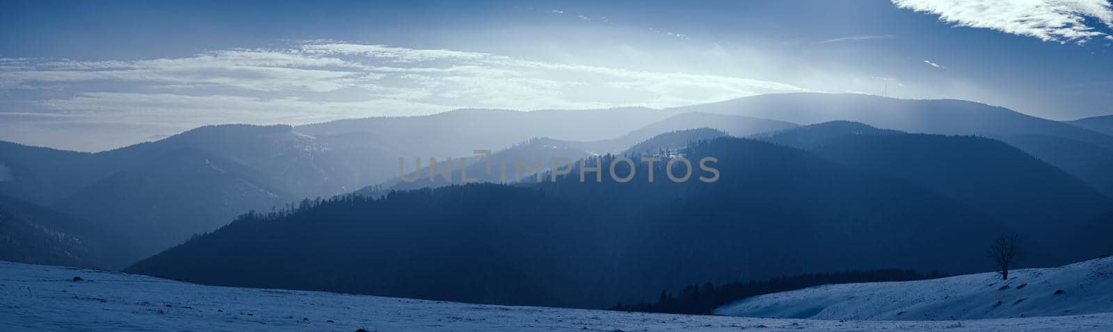 sun over the winter mountains with snow, Cindrel mountains, Paltinis, Romania by Roberto
