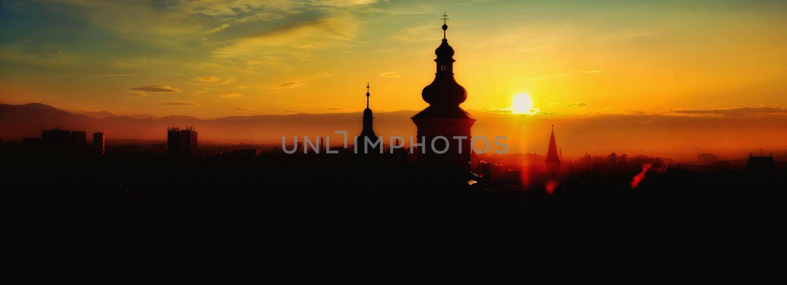 sunset over the city, Sibiu, Romania by Roberto