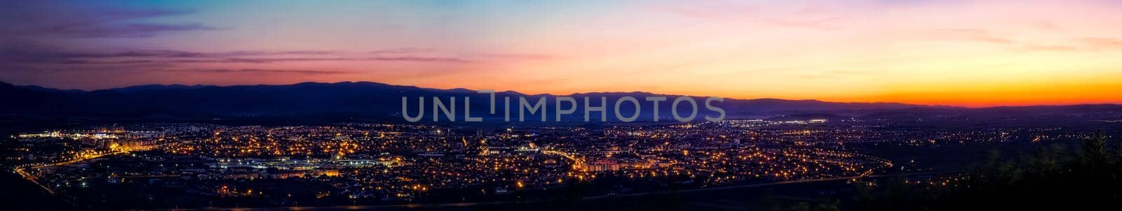 Sunset panoramic view over the Sibiu city, Romania by Roberto