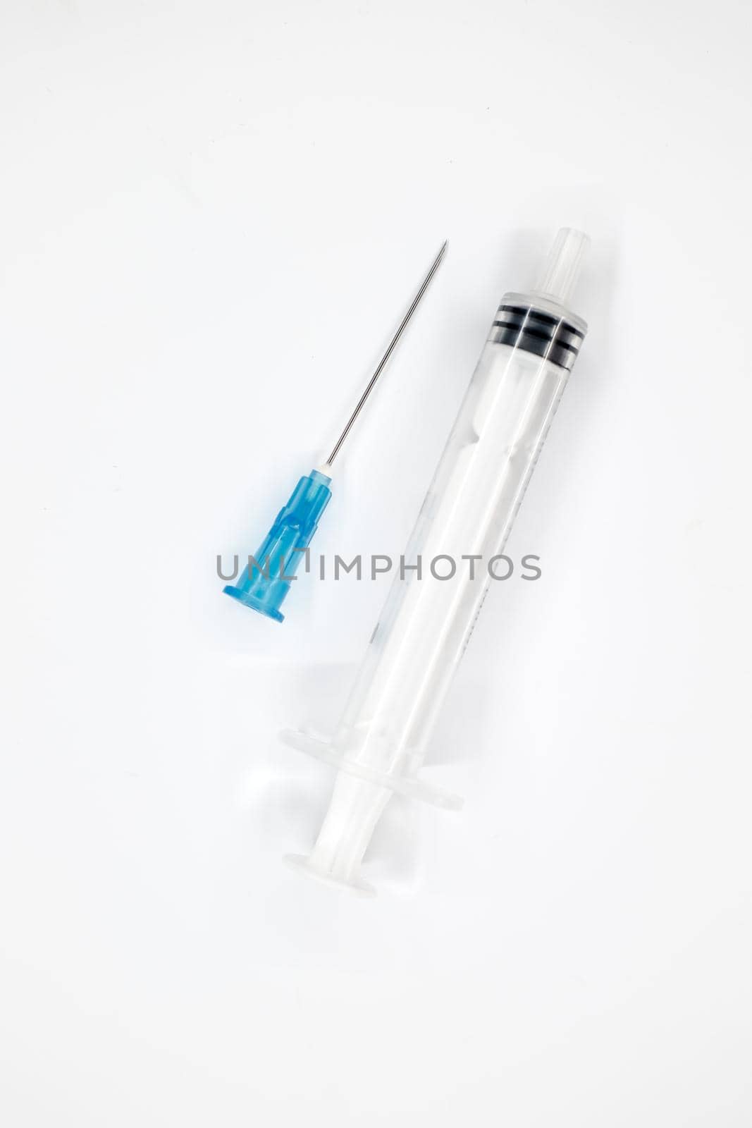 syringe with needle  on white